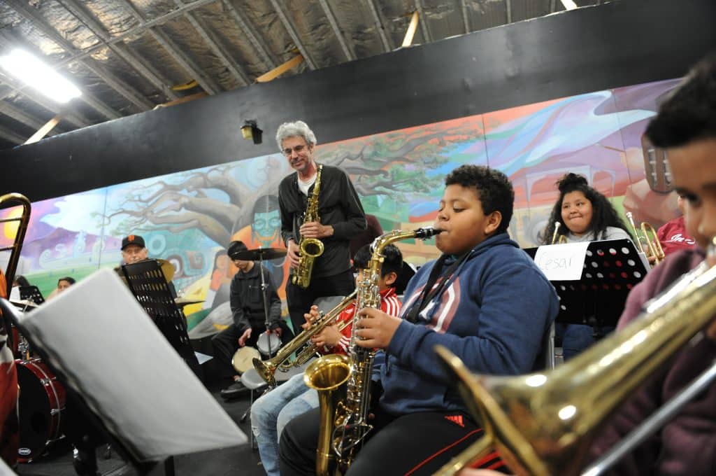 As part of ACANs Latin Jazz Ensemble, Angel Cervantes plays his saxophone as Gary Meek, one of several visiting instructors from the Monterey Jazz Festival, looks on.
Salinas Youth Initiative: Alisal Community Arts Network
United States, California, Monterey County, Salinas, Monterey, Jay Dunn, The Packard Foundation, Alisal Community Arts Network, photographer, freelance, photography, multimedia, video, social justice, social services, photojournalism, www.jaydunn.org, jay@jaydunn.com