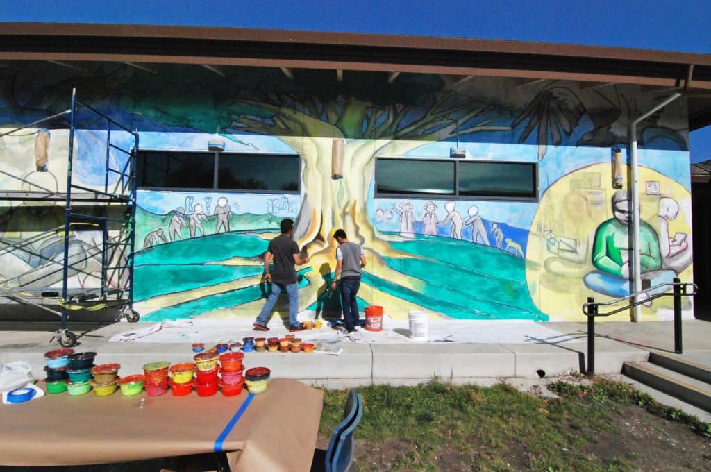 Photographed in October of 2016, a view of the progress Hijos del Sol artists are making on the groups new education-themed mural at the César Chávez Library in east Salinas.
Salinas Youth Initiative: Hijos del Sol
United States, California, Monterey County, Salinas, Monterey, Jay Dunn, The Packard Foundation, Hijos del Sol, photographer, freelance, photography, multimedia, video, social justice, social services, photojournalism, www.jaydunn.org, jay@jaydunn.com