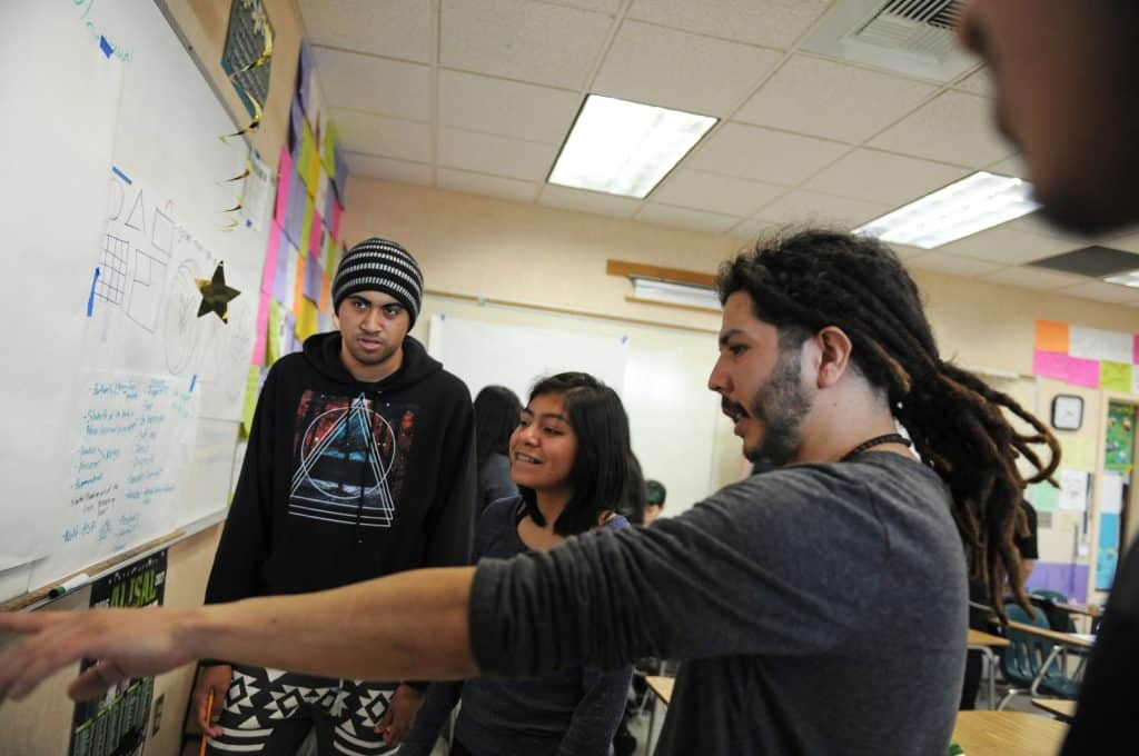 Urban Arts Collaboratives Luis Rodriguez, right, and Danny Montenegro, not pictured, work with members of the Alisal High School Be Yourself club on several artworks created for the second LatinX LGBTQ Film Festival in Salinas.
Salinas Youth Initiative: Urban Arts Collaborative
United States, California, Monterey County, Salinas, Monterey, Jay Dunn, The Packard Foundation, Urban Arts Collaborative, photographer, freelance, photography, multimedia, video, social justice, social services, photojournalism, www.jaydunn.org, jay@jaydunn.com